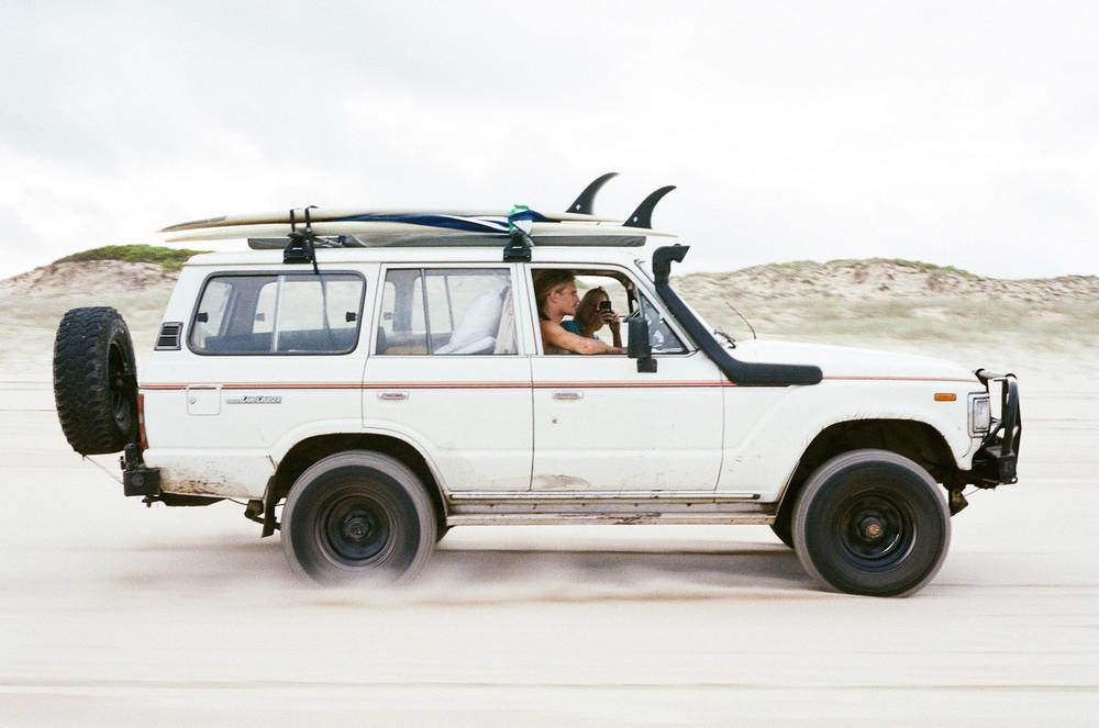 Kai flying up the beach along side myself and my good friend Alex, in search of isolated waves and a nice spot to post up for the day