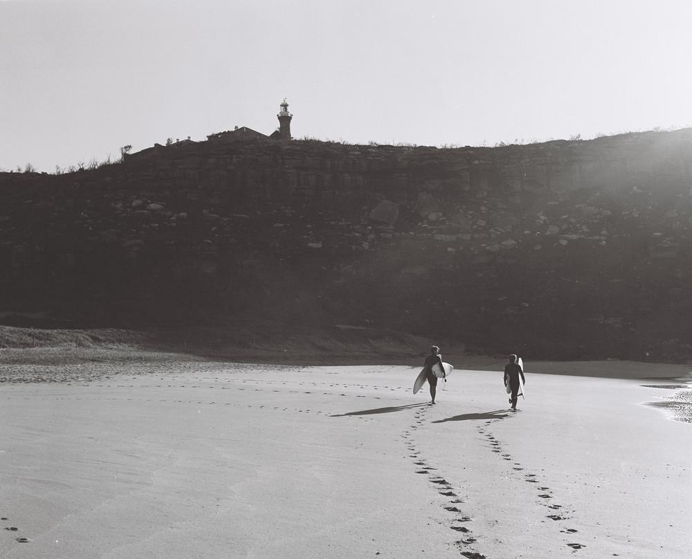 Carl and Jake wondering up to the lighthouse one autumn morning